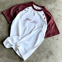 T-shirt vintage court et ample à col détachable et manches raglan, personnalisé avec impression DTG par Ouna Clothing Manufacturer