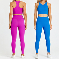 Logo personnalisé Ensemble de sport de yoga pour femmes Haut de soutien-gorge de sport antibactérien de couleur unie et leggings taille haute sans couture pour l'entraînement et le soulèvement des fesses