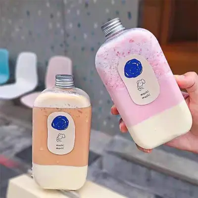 Düz kare plastik içecek şişesi tek kullanımlık içecek Pet plastik süt çay şişesi plastik şişe