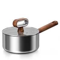 Nouvel ensemble d'ustensiles de cuisine de luxe en acier inoxydable 304 triple couche avec revêtement en titane, durable, compatible induction, avec poignée en bois, OEM