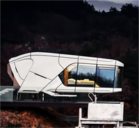 Lit préfabriqué pour dormir en extérieur Cabine Pod Maison mobile préfabriquée Petite maison Conteneur moderne de luxe à ossature en acier Maison d'hôtel à capsule spatiale