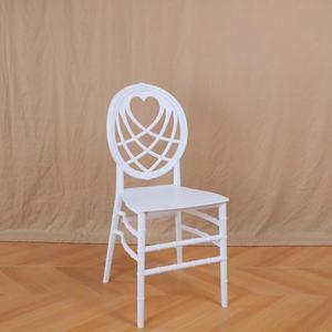Venta al por mayor precio <span class=keywords><strong>barato</strong></span> Silla <span class=keywords><strong>de</strong></span> boda con patrón <span class=keywords><strong>de</strong></span> diseño <span class=keywords><strong>de</strong></span> corazón en silla <span class=keywords><strong>de</strong></span> plástico blanco utilizado para el <span class=keywords><strong>alquiler</strong></span> <span class=keywords><strong>de</strong></span> comedor del evento - Product Image 1
