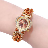 Montre-bracelet à quartz pour femme, forme cœur, avec lunette incrustée, cadran, bracelet en corde tressée et chaîne en métal doré, tendance