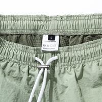 Vente en gros de shorts d'été personnalisés avec logo pour la course à pied 100% polyester double couche de 5 pouces pour hommes