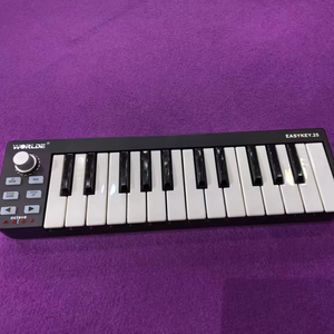 <span class=keywords><strong>WORLDE</strong></span> Easykey.25 Teclado <span class=keywords><strong>Controlador</strong></span> <span class=keywords><strong>MIDI</strong></span> USB Electrónico Portátil Mini de 25 Teclas - Product Image 1