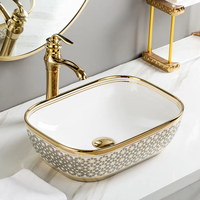 Lavabo de salle de bain rectangulaire en céramique dorée de luxe avec égouttoir pour montage sur robinet monotrou pour la maison ou l'hôtel