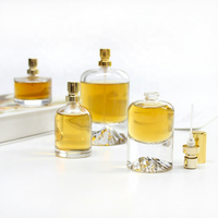 Flacon pulvérisateur unique à fond épais, flacon de parfum rond 30ml 50ml 100ml, flacon de parfum en verre de forme ronde en pierre volcanique