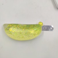 Levify Mignon Pendentif Anti-Stress en TPR Extensible en Forme de Banane Scintillante, Jouet Sensoriel Souple à Presser pour Adultes Unisexe, Fabriqué au Canada