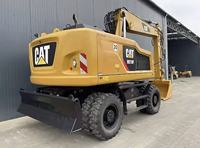 Excavatrice sur roues Caterpillar M318F d'occasion, godet de 0,91 m³, vitesse routière de 35 km/h, excellent état, directement de l'usine