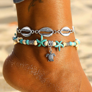 Chevillères de plage bohèmes double couche avec chaîne en coquillages cauris argentés, étoiles de mer turquoise et tortues marines, bijoux de pied pour les vacances - Product Image 1