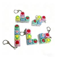 Nouveau produit 2026 : Porte-clés anti-stress en silicone coloré Maca, bouton de réduction de pression pour clavier, à presser avec les doigts