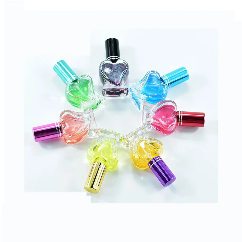 New Design Tiny Heart Shape Glass Bottle 10ml Clear Cute Perfume Empty Glass Bottle With Sprayer In Different Colors