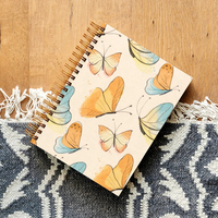 Cahier de revue à spirale à couverture en PVC de taille A5 le plus vendu pour les étudiants à utiliser au bureau 100 feuilles intérieures avec logo personnalisable