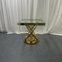 Table basse carrée en acier inoxydable avec plateau en verre trempé, design anneau torsadé doré, pour hôtels et villas, personnalisable