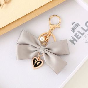 Porte-clés élégant en gros avec nœud papillon, magnifique breloque créative, pendentif souple pour sac, cadeaux de festival pour femmes - Product Image 6
