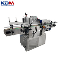 Machine d'étiquetage automatique KDM-AL150 pour bouteilles, bocaux, canettes et contenants cylindriques
