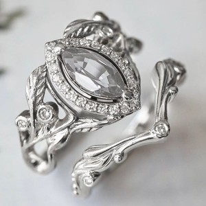 Anillo de circonita marquesa Xiyin de Yunnique, diseño de planta con pavé gris plateado, joyería de moda para fiestas - Product Image 1