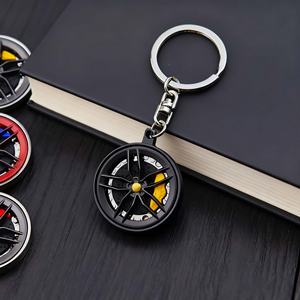 พวงกุญแจโลหะหมุนได้แบบขายส่ง สำหรับโปรโมชั่น ตกแต่งด้วยล้อดูดซับแรงกระแทก รูปทรงเทอร์โบรถยนต์ เหมาะสำหรับเป็นของขวัญ - Product Image 6