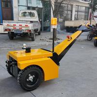 Tracteur de remorquage électrique compact à utilisation facile pour le remorquage de chariots à bagages d'aéroport