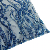 Tissu en maille brodé de sequins pour robe de mariée