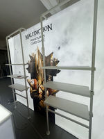 Stand d'exposition modulaire portable avec éclairage, étagère et table intégrées pour salon professionnel