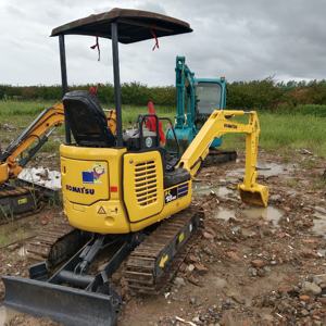 Miniexcavadora sobre orugas Komatsu PC18MR de Japón, compacta y potente de segunda mano con motor central y bomba para espacios reducidos - Product Image 1