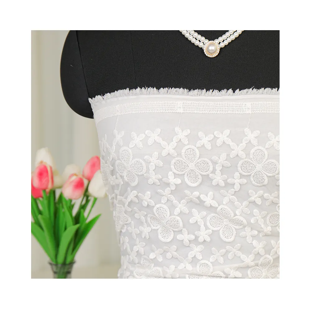 Precio bajo China al por mayor tela de encaje gasa blanca plana bordada telas de encaje de algodón suave bordado en vestido de novia personalizado