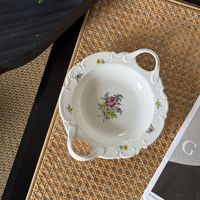 Assiette ovale en céramique à double anse, motif floral en relief, style classique français, design rétro de luxe léger, pour soupes, desserts et fruits
