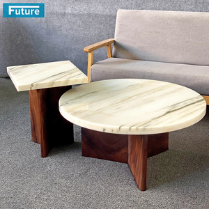 โต๊ะกาแฟหินอ่อน Calacatta Gold ทรงกลมหรูหรา 100% ทำจากหินธรรมชาติ สำหรับห้องนั่งเล่นในอพาร์ตเมนต์ พร้อมขาไม้เตี้ย - Product Image 1