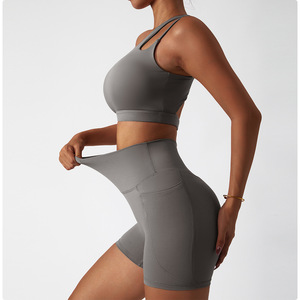 Gym 2 pezzi all'ingrosso Set Yoga reggiseno sportivo monospalla da donna Top due pezzi a vita alta <span class=keywords><strong>Leggins</strong></span> Pocket Set Fitness da donna - Product Image 1