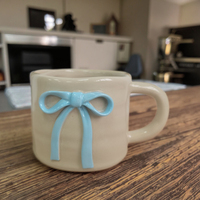 Tasse en céramique émaillée personnalisée avec nœud papillon en relief tasse de décoration quotidienne en porcelaine objets de décoration pour la maison