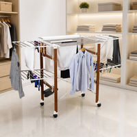 Porte-vêtements pliable en métal multifonctionnel à double niveau, moderne, pour intérieur/extérieur, portable et durable, idéal pour la salle de bain