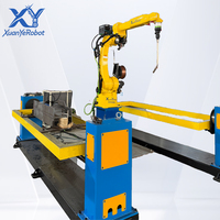 Station de travail robotisée de soudage à double position industrielle, cellule de soudage robotisée pour la soudure de pièces automobiles, de matériel et de métaux