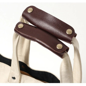 En stock: Correas de mano protectoras y fundas para asas para bolsas grandes de lona y equipaje, diseñadas para ahorrar esfuerzo y proteger sus pertenencias. - Product Image 2