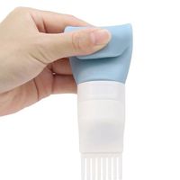 Bouteille rechargeable réutilisable en silicone Distributeur de shampoing de voyage Bouteille compressible Bouteilles à tête de brosse de voyage en silicone pour articles de toilette