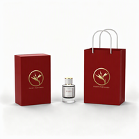 Flacon de parfum en verre rond rechargeable de haute qualité, boîte cadeau en forme de livre au design personnalisé pour l'emballage de marques de parfum