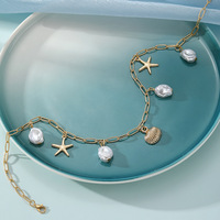 Collier multi-rangs pour femme en alliage, avec étoile de mer, coquillage, résine et perles d'imitation, design coquille de perle, très vendu
