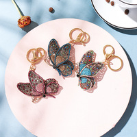 Porte-clés papillon ajouré incrusté de diamants, couleur tendance, cadeau créatif et exquis