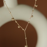 Collar de cadena tipo lariat en forma de Y de moda, chapado en oro de 18 quilates, de acero inoxidable, con colgante de bola delicado y borla larga, para mujer, ideal para fiestas y vestidos.