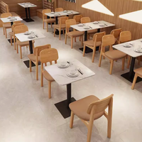 Tables et chaises modernes Foshan Meubles de restaurant commercial en bois massif en cuir PU taille personnalisable
