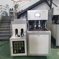 Machine semi-automatique à 2 cavités pour bocaux en PET Machine de fabrication de canettes en PET Machine de fabrication de bouteilles d'eau en plastique