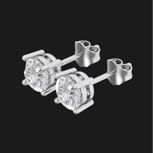 Boucles d'oreilles clous en moissanite ronde brillante dans un serti en argent poli, conçues pour une élégance moderne avec une touche d'inspiration hip-hop. - Product Image 1