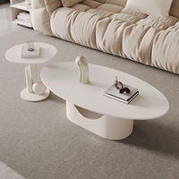 Nouvelle table basse et table à thé ovale en pierre frittée 2026 avec structure métallique et design décoratif pour petit salon, mobilier de maison