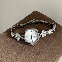 Montre femme élégante mignonne, bracelet chaîne émail fleuri rose, cadran carré irrégulier doux, montre quartz
