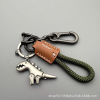 Porte-clés dinosaure T-Rex en alliage de zinc personnalisé avec cordon tressé pour voiture, sac à dos, sac à main, cadeau, vente en gros