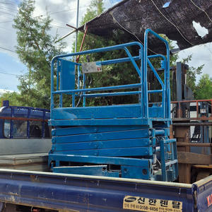 [UpRight] Plateforme de travail en hauteur mobile à ciseaux électriques d'occasion, hauteur de travail de 7,8 m, plateforme de travail en hauteur mobile, élévateur à homme mobile MX-19, moteur haute efficacité - Product Image 3