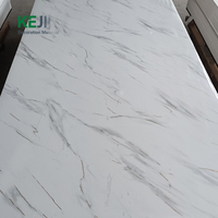 Vente chaude Panneaux muraux en PVC décoratifs intérieurs imperméables de style moderne Feuille de marbre en PVC