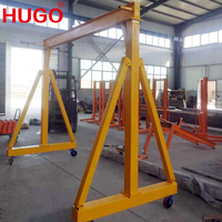 Grue à portique miniature HUGO d'occasion pour entrepôt, avec roues en caoutchouc, capacité de 0,5 à 50 tonnes, hauteur de levage réglable, utilisation intérieure/extérieure