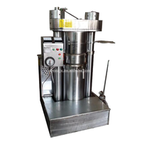 Machine hydraulique de pressage d'huile de beurre de cacao/presseur d'huile de sésame froid/machine d'extraction d'huile de beurre de fèves de cacao