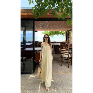 เดรสยาวสีครีมสุดหรู แต่งลูกไม้ปักที่คอเสื้อ แขนกุด กระโปรงยาวพลิ้วไหว เหมาะสำหรับวันพักผ่อนริมชายหาด ราคาสุดคุ้ม - Product Image 2
